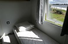 Rangement du lit gigogne pour un espace jeu ou lit bébé