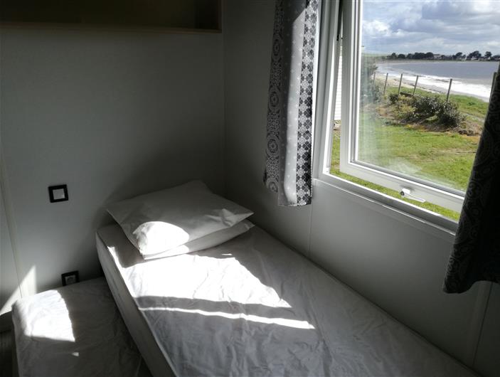 Rangement du lit gigogne pour un espace jeu ou lit bébé