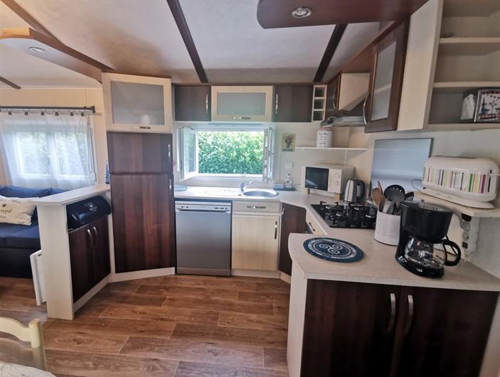 Cuisine équipée du locatif - camping Parc les goélands