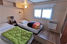 Louer un mobil home 3 chambres 1 à 6 pers à la mer - camping 3 étoiles